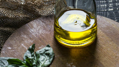 Welke olijfolie past het beste bij salades?